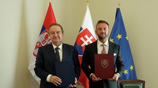Ministar unutrašnjih poslova Ivica Dačić i ministar unutrašnjih poslova Slovačke Matuš Šutaj Eštok. Ministar unutrašnjih poslova Ivica Dačić i ministar unutrašnjih poslova Slovačke Matuš Šutaj Eštok. - Sputnik Srbija