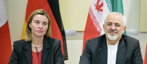 Шефица дипломатије ЕУ Федерика Могерини и ирански министар спољних послова Мохамад Џавад Зариф - Sputnik Србија