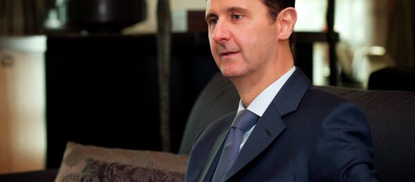Syria's President Bashar al-Assad is seen during an interview with the American magazine Foreign Affairs published in Damascus January 26, 2015 - Sputnik Srbija