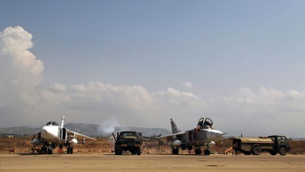 Руски авиони у бази Хмејмим у Сирији - Sputnik Србија