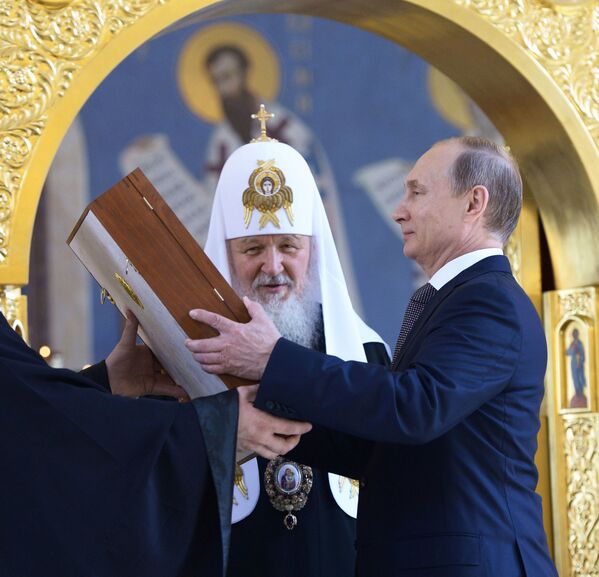 Predsednik Rusije Vladimir Putin i ruski patrijarh Kiril - Sputnik Srbija
