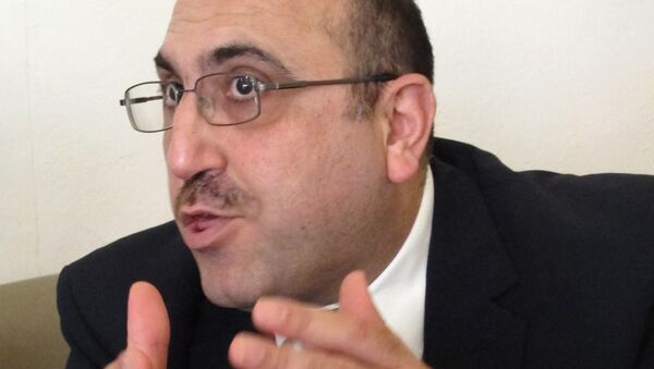 Rami Abdulrahman direktor Sirijske opservatorije za ljudska prava - Sputnik Srbija