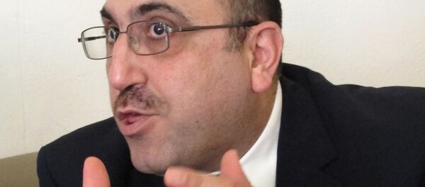 Rami Abdulrahman direktor Sirijske opservatorije za ljudska prava - Sputnik Srbija