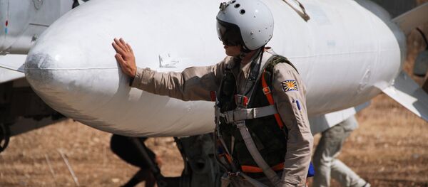 Руски пилот у авиобази Хмејмим у Сирији - Sputnik Србија