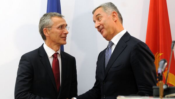 Generlani sekretar NATO-a Jens Stoltenberg i premijer Crne Gore Milo Đukanović - Sputnik Srbija