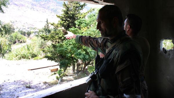 Сирийские военные в деревне Эль-Фуру, освобожденной сирийской армией от боевиков Фронта ан-Нусра - Sputnik Србија