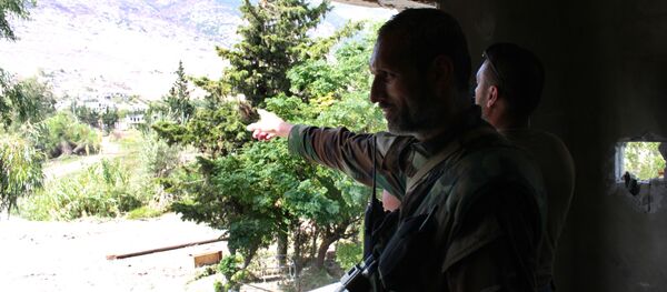 Сирийские военные в деревне Эль-Фуру, освобожденной сирийской армией от боевиков Фронта ан-Нусра - Sputnik Србија