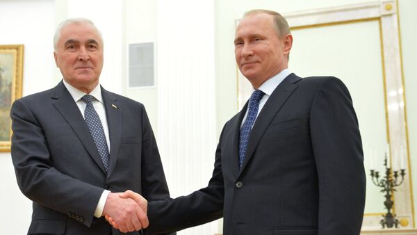 Predsednik Južne Osetije Leonid Tibilov i predsednik Rusije Vladmir Putin - Sputnik Srbija