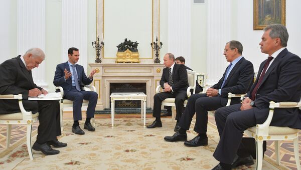Ruski predsednik Vladimir Putin i sirijski predsednik Bašar el Asad na sastanku u Moskvi - Sputnik Srbija