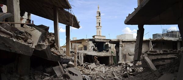 Militanti uništili izbeglički centar u Homsu - Sputnik Srbija