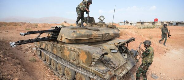Borci 10-te divizije 2-gog korpusa sirijske vojske u gradu Katana u Siriji - Sputnik Srbija