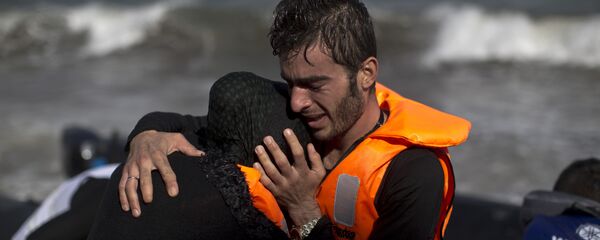 Izbeglice iz Sirije na grčkom ostrvu Lezbos. - Sputnik Srbija