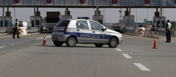 Srpska policija na graničnom prelazu Batrovci. Srpska policija na graničnom prelazu Batrovci. - Sputnik Srbija