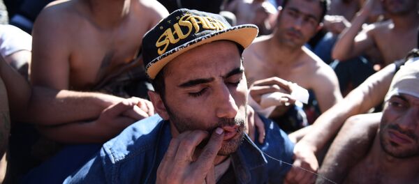 Мигранти из Сирије у Македонији у знак протеста зашивају усне Мигранти из Сирије у Македонији у знак протеста зашивају усне - Sputnik Србија