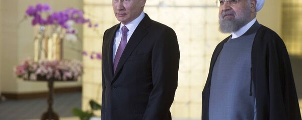Riski predsednik Vlaldimir Putin i iranski predsednik Hasan Rohani - Sputnik Srbija