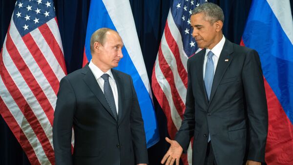 Предеседник Русије Владимир Путин и амерички председник Барак Обама - Sputnik Србија