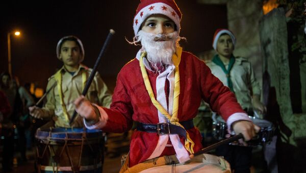 На улицама Дамаска током прославе Божића по Григоријанском календару - Sputnik Србија