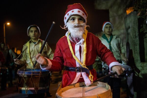 На улицама Дамаска током прославе Божића по Григоријанском календару - Sputnik Србија