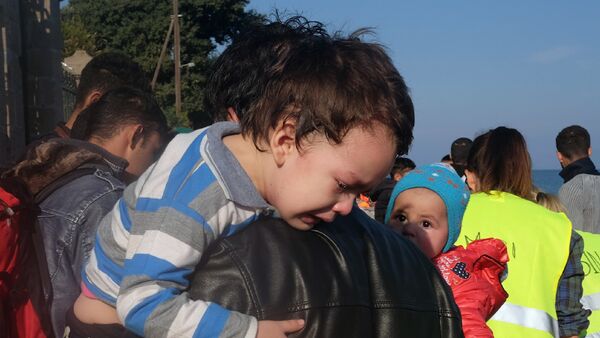 Мигранити из Сирије у на грчком острву Лезбос - Sputnik Србија