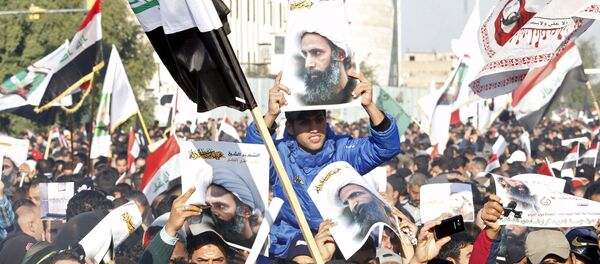 Присталице шиитског покрета у Ираку протестују у Багдаду због убиства свештеника Нимра ел Нимра - Sputnik Србија