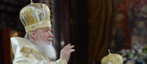 Патријарх Московски и целе Русије Кирил на божићној литургији у Храму Христа Спаса  Москви. - Sputnik Србија