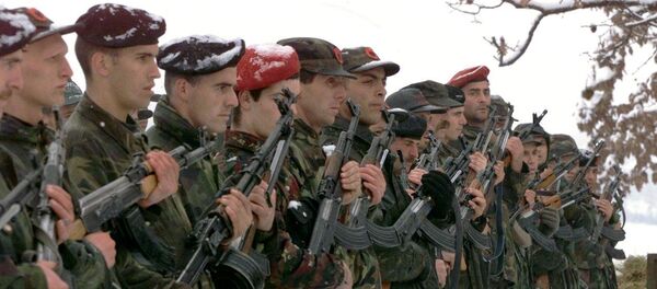 Pripadnici teroritičke organizacije OVK na Kosovu Pripadnici teroritičke organizacije OVK na Kosovu - Sputnik Srbija