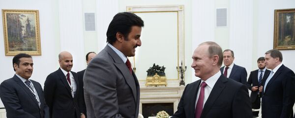 Ruski predsednik Vladimir Putin i emir Katara Tamim bin Hamad Al Tani - Sputnik Srbija