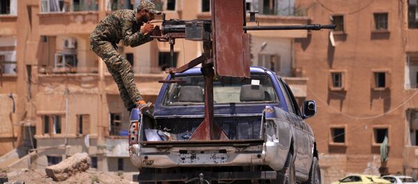 Припадник Курдске народне заштите на северо-западу сиријске провинције Хасеках, 26. јула 2015. - Sputnik Србија
