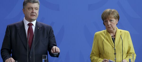 Украјински председник Петро Порошенко и немачка канцеларка Ангела Меркел Украјински председник Петро Порошенко и немачка канцеларка Ангела Меркел - Sputnik Србија