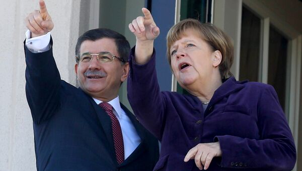 Ahmet Davutoglu i Angela Merkel - Sputnik Srbija