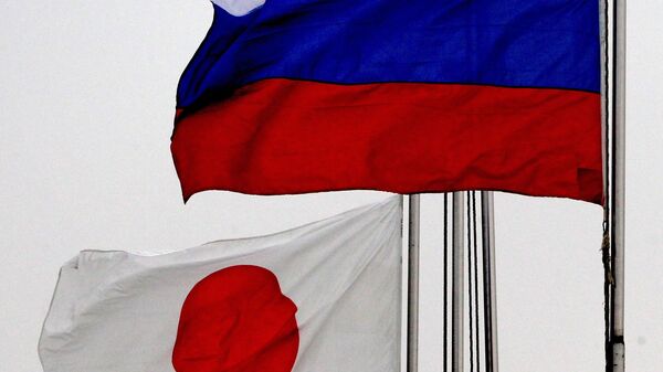 Zastave Rusije i Japana - Sputnik Srbija