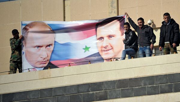 Плакат са ликом Владимира Путина и Башара Асада - Sputnik Србија