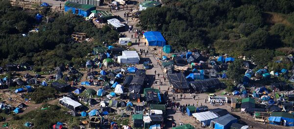 Избеглички камп у Калеу - Sputnik Србија