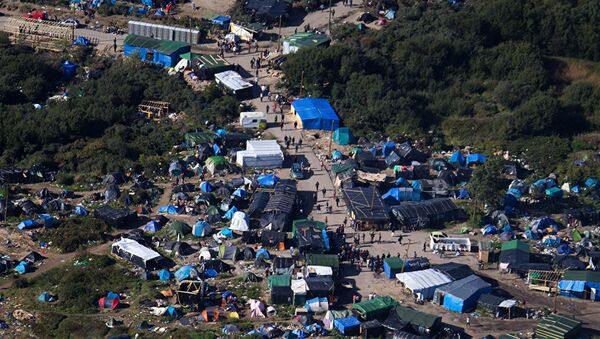 Избеглички камп у Калеу - Sputnik Србија