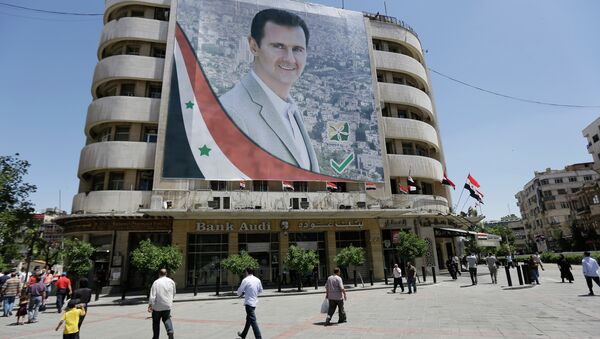 Baner sa likom Bašara el Asada u Damasku, Sirija - Sputnik Srbija