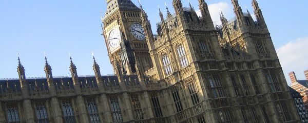 Вестминстерска палата у Лондону, поред Темзе, седиште је Парламента Уједињеног Краљевства Велике Британије Вестминстерска палата у Лондону, поред Темзе, седиште је Парламента Уједињеног Краљевства Велике Британије - Sputnik Србија