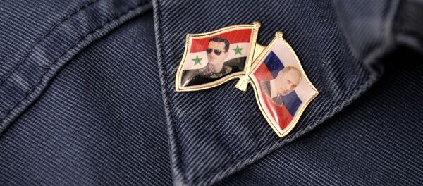 Беџ на униформи сервисера авиона у бази Хмејмим у Латакији - Sputnik Србија