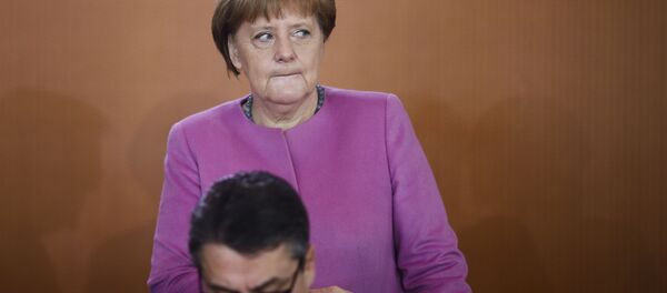 Kancelarka Nemačke Angela Merkel i vicekancelar i ministar ekonomije Zigmar Gabrijel - Sputnik Srbija