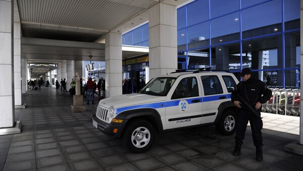 Полиција близу на аеродрому Близу Атине, Грчка 22.03. 2016. године - Sputnik Србија