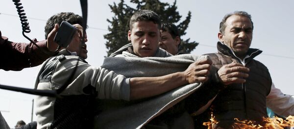 Избеглице се самоспаљују у кампу Идомени ма грчко-македонској граници - Sputnik Србија