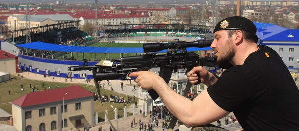 Чувари реда на стадиону С. Г. Билимханов у Грозном Чувари реда на стадиону С. Г. Билимханов у Грозном - Sputnik Србија