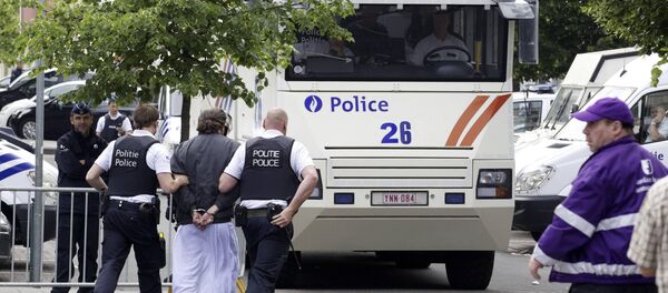 Хапшење екстремних муслимана у насељу Моленбек у Бриселу 2012. године - Sputnik Србија