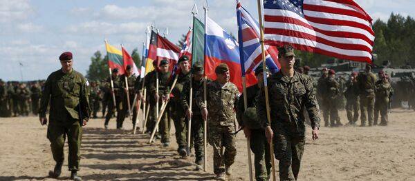 Војници из НАТО земаља присуствују церемонији отварања војне вежбе - Sputnik Србија