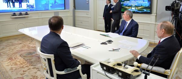 Vladimir Putin na video-konferenciji Vladimir Putin na video-konferenciji - Sputnik Srbija