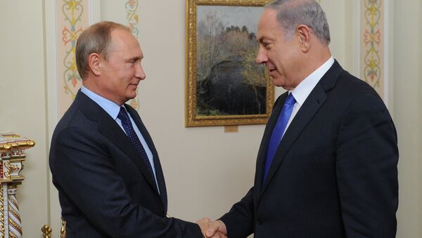 Руски председник Владимир Путин и премијер Израела Бенјамин Нетанјаху - Sputnik Србија