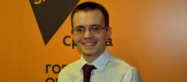 Новинар Ендру Корибко - Sputnik Србија