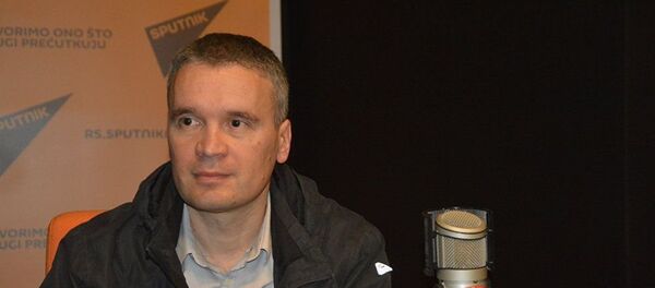 Иницијатор преноса Благодатног огња Бранко Вукомановић Иницијатор преноса Благодатног огња Бранко Вукомановић - Sputnik Србија
