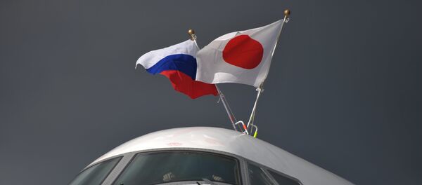 Јапанска и руска застава - Sputnik Србија