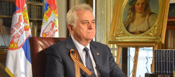 Председник Србије Томислав Николић са Георгијевском лентом - Sputnik Србија