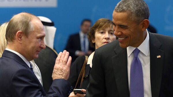 Predsednik Rusije Vladimir Putin (L) i predsednik SAD Barak Obama - Sputnik Srbija